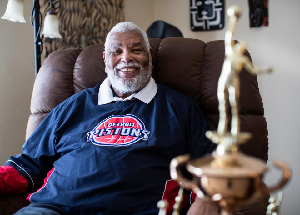 Ray Scott, 82, who was awarded NBA Coach of the Year for the 1973-74 season, poses for photo at home in Ypsilanti Township on Saturday, Feb. 13, 2021.