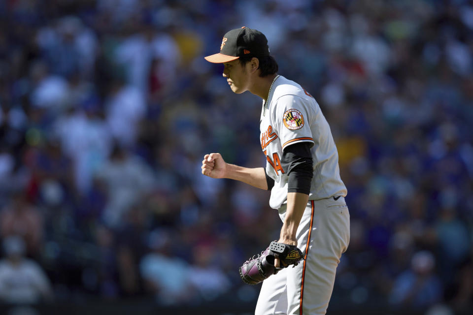 Baltimore Orioles relief pitcher Shintaro Fujinami pumps his fist after the final out against the Seattle Mariners during a baseball game, Sunday, Aug. 13, 2023, in Seattle. The Orioles won 5-3. (AP Photo/John Froschauer)