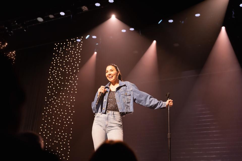 Whitney Cummings presenting at one of her stand up comedy shows.