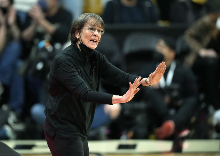 Stanford head coach Tara VanDerveer directs her team against Colorado in the first half of an NCAA college basketball game Friday, Jan. 14, 2022, in Boulder, Colo. (AP Photo/David Zalubowski)