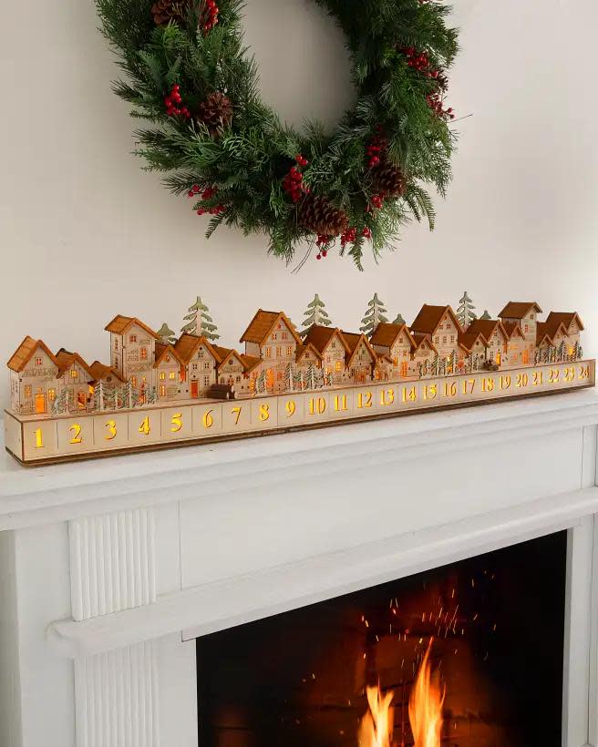 <p><a href="https://go.redirectingat.com?id=74968X1596630&url=https%3A%2F%2Fwww.balsamhill.com%2Fp%2Fwooden-christmas-mantel-village-decors%3Fsku%3D4003282%26module%3D1&sref=https%3A%2F%2Fwww.veranda.com%2Fshopping%2Fg41497590%2Fluxury-christmas-decorating-ideas%2F" rel="nofollow noopener" target="_blank" data-ylk="slk:Shop Now;elm:context_link;itc:0;sec:content-canvas" class="link rapid-noclick-resp">Shop Now</a></p><p>Wooden Christmas Mantel Village</p><p>balsamhill.com</p><p>$279.00</p>