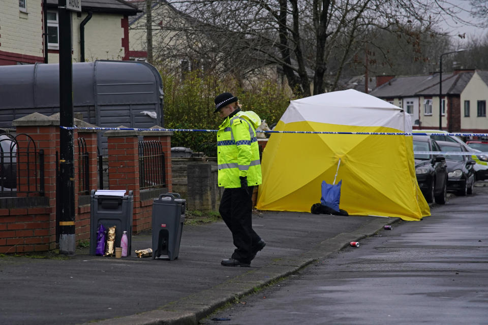 A forensic tent on Thirlmere Avenue in Stretford, Manchester, near to the scene where a 16-year-old boy was fatally stabbed. Paramedics treated the boy at the scene before he was taken to hospital where he died of his injuries. Picture date: Sunday January 23, 2022.