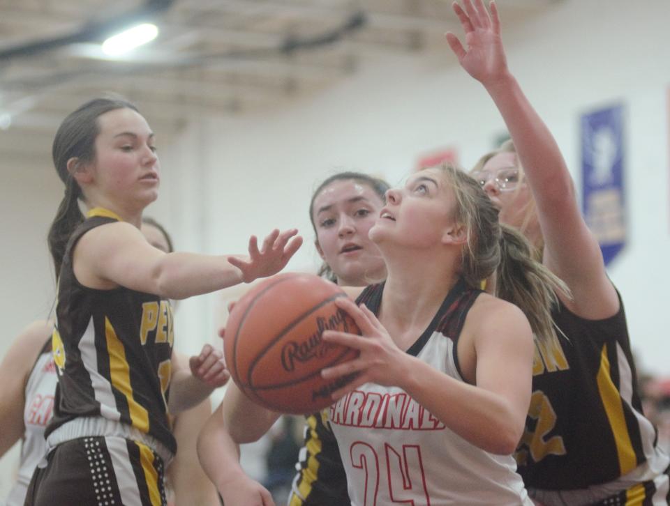 Jayden Marlatt shoots through a crowd during a matchup between Johannesburg-Lewiston and Pellston on Wednesday, February 1.