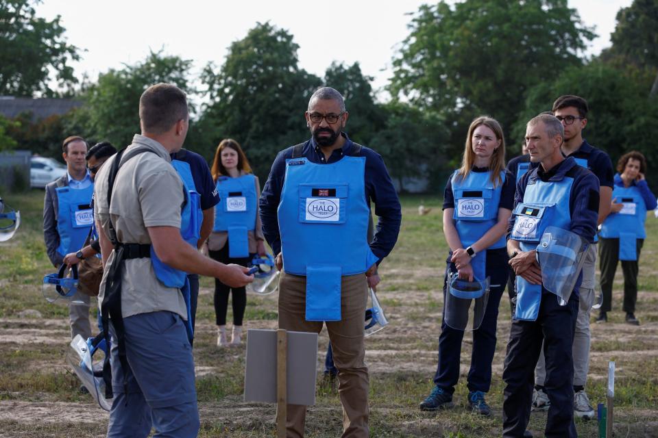 Foreign Secretary James Cleverly as he visits members of the Halo Trust non-commercial charity organisation for demining in the village of Hrebelky, in Kyiv region (PA)