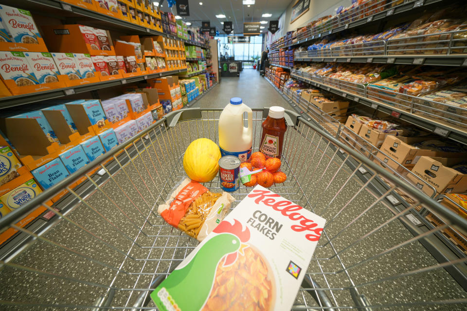 supermarket  TARLETON, UNITED KINGDOM - JULY 22: In this photo illustration a shopping trolley is filled with groceries at the new Tarleton Aldi store on July 22, 2022 in Tarleton, United Kingdom.  Aldi is the UK’s fifth largest supermarket chain and has 950 stores. The new Aldi store is the first in the Preston area. (Photo illustration by Christopher Furlong/Getty Images)