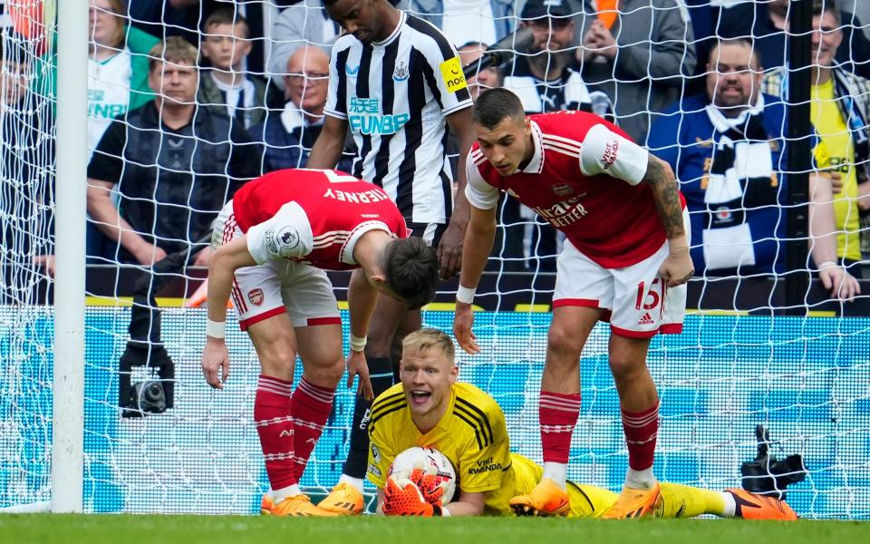 Aaron Ramsdale holds on to the ball during the second half at Newcastle - Arsenal's time-wasting at Newcastle fully documented - AP/Jon Super