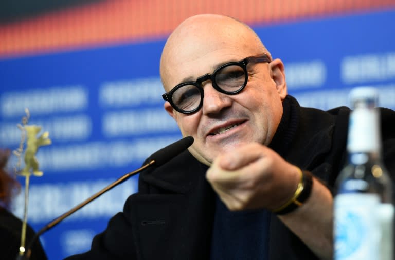 Italian director Gianfranco Rosi attends a press conference for the film "Fuocoammare" (Fire At Sea) screened in competition at the 66th Berlinale Film Festival in Berlin on February 13, 2016