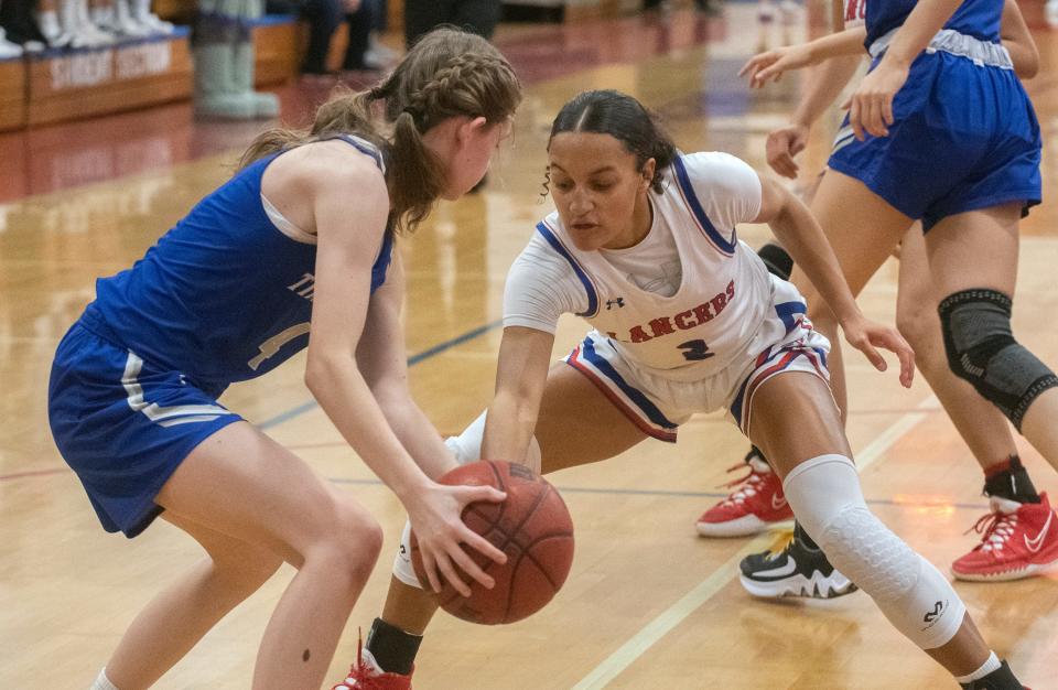 East Union's Taylor Snaer, right, guards Sierra's Emma Gilmore during a girls varsity baseball game on Thursday, Jan. 19, 2023 in Manteca. East Union won 63-39.