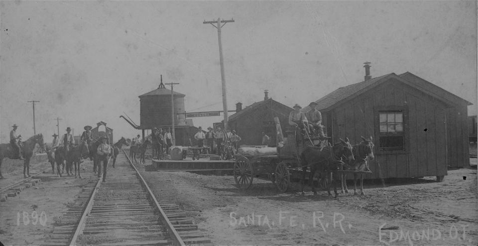 Edmond came into existence when the Santa Fe railroad laid tracks and built a coal and watering station in 1887. The exhibit includes photographs of the early Edmond Station in 1890.