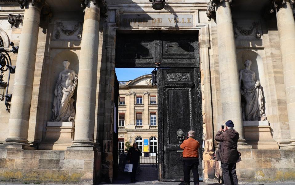 The doors to City Hall are still standing but now blistered and black