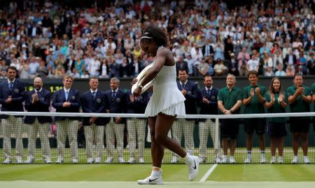 Britain Tennis - Wimbledon - All England Lawn Tennis & Croquet Club, Wimbledon, England - 9/7/16 USA's Serena Williams celebrates winning her womens singles final match against Germany's Angelique Kerber with the trophy REUTERS/Andrew Couldridge