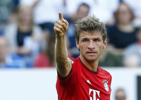 Bayern Munich's Thomas Mueller celebrates his goal against TSG 1899 Hoffenheim during their German Bundesliga first division soccer match in Sinsheim, Germany, August 22, 2015. REUTERS/Ralph Orlowski