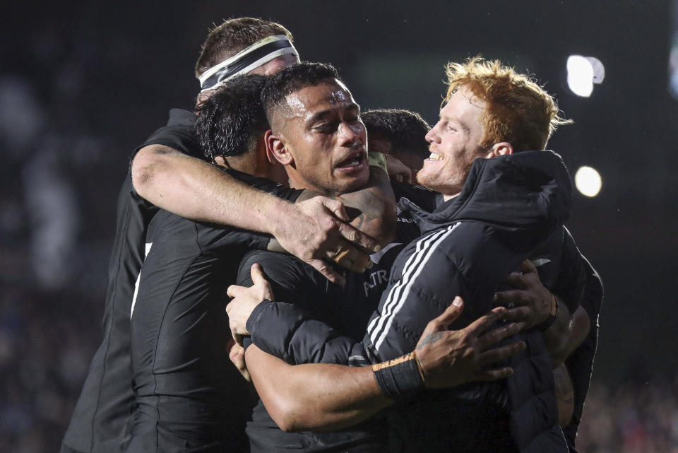 New Zealand's Shannon Frizell, centre, is congratulated by teammates after scoring a try during the Rugby Championship test match between the All Blacks and South Africa at Mt Smart Stadium in Auckland, New Zealand, Saturday, July 15, 2023. ( Shane Wenzlick/Photosport via AP)