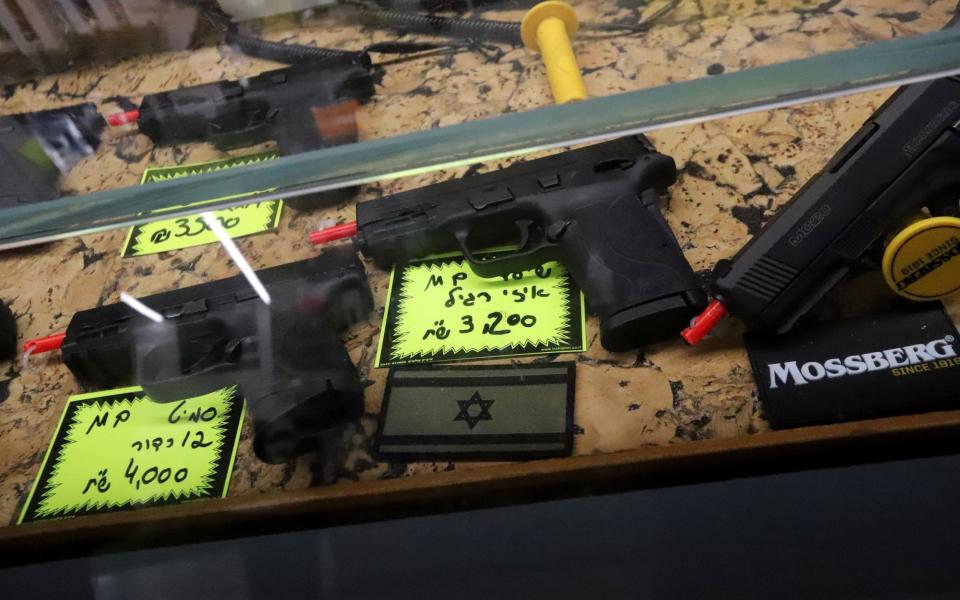 Guns for sale are seen at a Jerusalem shooting ranges - Quique Kierszenbaum