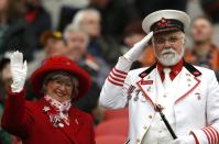 Fans celebrate in the stands ahead of the CFL's 102nd Grey Cup football championship between the Calgary Stampeders and the Hamilton Tiger Cats in Vancouver, British Columbia, November 30, 2014. REUTERS/Todd Korol (CANADA - Tags: SPORT FOOTBALL)