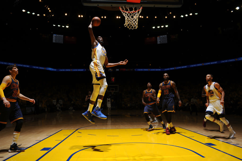 Kevin Durant dunks against the Cleveland Cavaliers in Game 1 of the 2017 NBA Finals. He did a lot of that in the first half. (Garrett Ellwood/NBAE/Getty Images)