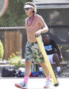 <p>A shirtless Gavin Rossdale plays a round of tennis with a friend on Friday in L.A.</p>