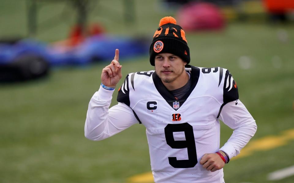 Cincinnati Bengals' Joe Burrow reacts as he leaves the field following of an NFL football game against the Tennessee Titans, Sunday, Nov. 1, 2020, in Cincinnati.  - AP