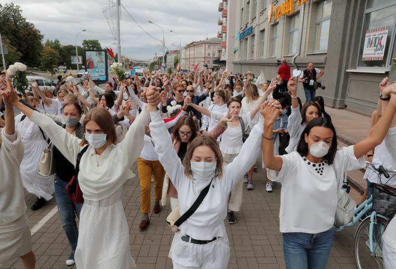Women take part in a demonstration against police violence in Minsk