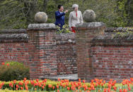 Britain's Prime Minister Theresa May shows Prime Minister Shinzo Abe of Japan around the garden during a visit to Chequers, near Wendover, Britain April 28, 2017. REUTERS/Kirsty Wigglesworth/Pool