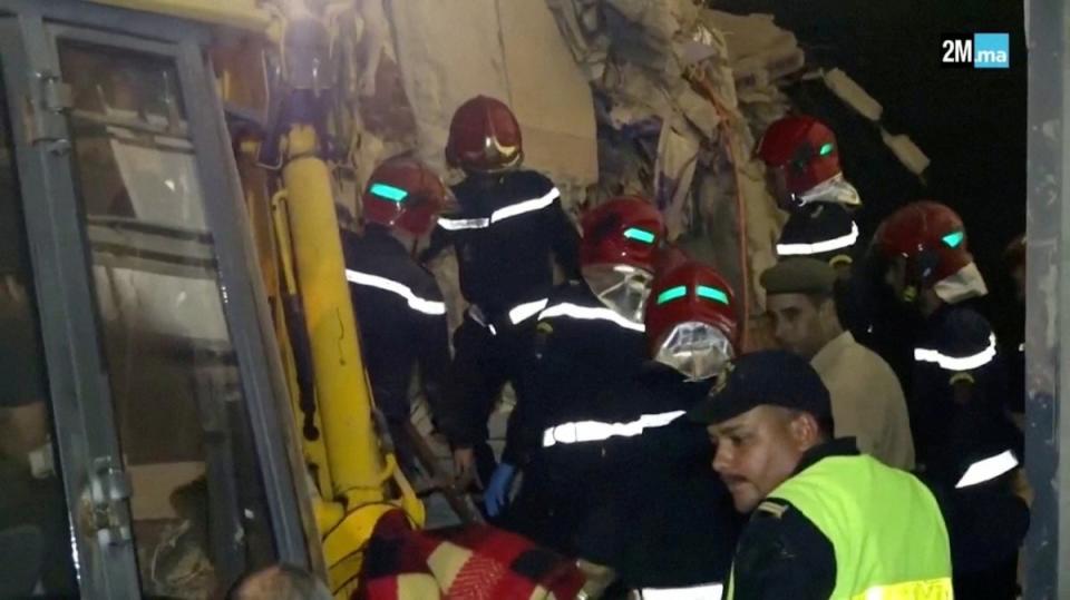 Civil protection members search for survivors near rubble, following an earthquake, in Chichaoua, Morocco (Reuters)