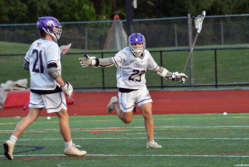 Smithsburg's Garrett Mazenko (23) celebrates his goal in the first quarter of Monday's Maryland Class 1A West Region II boys lacrosse championship game against Catoctin at Callas Stadium in Hagerstown. The Leopards won 10-9 for their fifth straight region title.