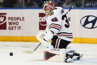 Chicago Blackhawks goaltender Kevin Lankinen makes a save against against the New York Rangers during the first period of an NHL hockey game Saturday, Dec. 4, 2021, at Madison Square Garden in New York. (AP Photo/Mary Altaffer)