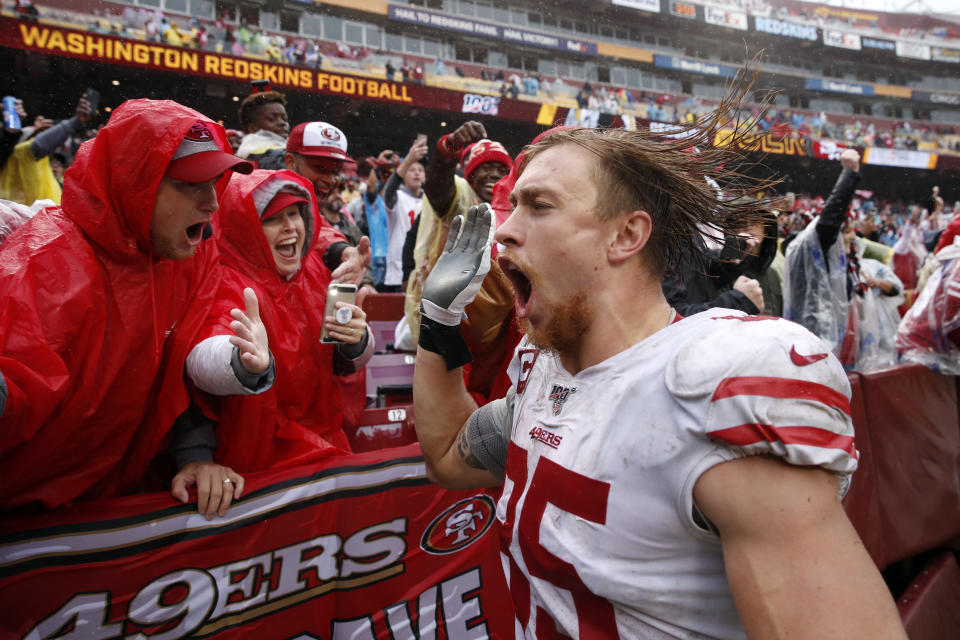 San Francisco 49ers tight end George Kittle celebrates with fans after an NFL football game against the Washington Redskins, Sunday, Oct. 20, 2019, in Landover, Md. San Francisco won 9-0. (AP Photo/Alex Brandon)