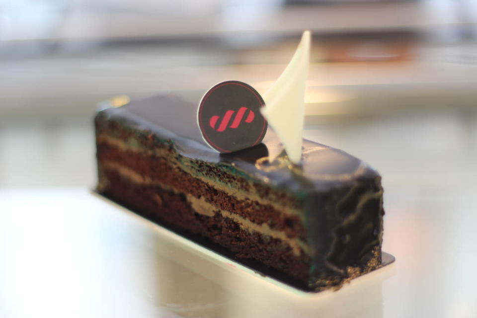 <p>Local cafe Pulse brought out their best-selling Naomi cake for chocolate lovers at the festival. This decadent fudge cake filled with chocolate ganache was the perfect pair to any types of coffee. </p>