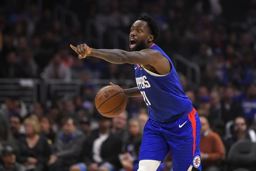 Los Angeles Clippers guard Patrick Beverley gestures during the first half of an NBA basketball game.