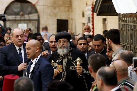 Egyptian Coptic Pope Tawadros II (C), head of the Coptic Orthodox church, arrives to the funeral of Anba Abraham, Coptic Orthodox Metropolitan Archbishop of Jerusalem and the Near East, in Jerusalem's Old City November 28, 2015. REUTERS/Ronen Zvulun