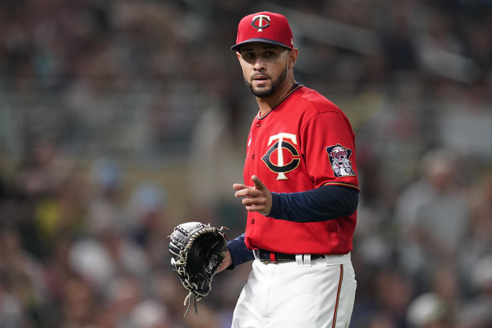 Minnesota Twins relief pitcher Jovani Moran reacts after the top of the eighth inning of the team's baseball game against the Kansas City Royals, Tuesday, Sept. 13, 2022, in Minneapolis. (AP Photo/Abbie Parr)