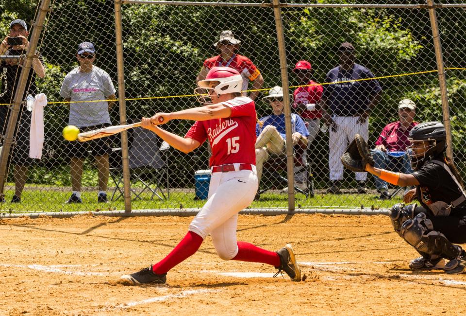 North Rockland's Olivia Leon makes contact for her game-winning walk-off single. North Rockland defeated White Plains, 2-1, in eight innings of the Section 1 Class AA championship game at North Rockland High School on May 29, 2022.