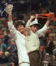 Tennessee head coach Pat Summitt holds up the net with her son Tyler after the Lady Vols defeated Old Dominion 68-59 to win the NCAA Division I Women's Final Four Tournament Sunday, March 30, 1997, in Cincinnati. (AP Photo/Amy Sancetta)
