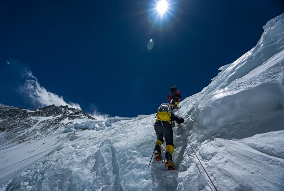 <div class="inline-image__caption"><p>Team members climb Mt. Everest during an expedition to find Sandy Irvine's remains. </p></div> <div class="inline-image__credit">National Geographic/Renan Ozturk</div>