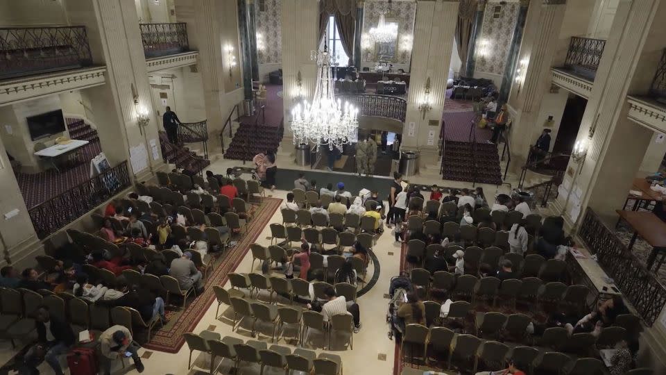 The grand lobby of the Roosevelt Hotel is now a waiting room for asylum seekers looking for help in New York City. - Evelio Contreras/CNN