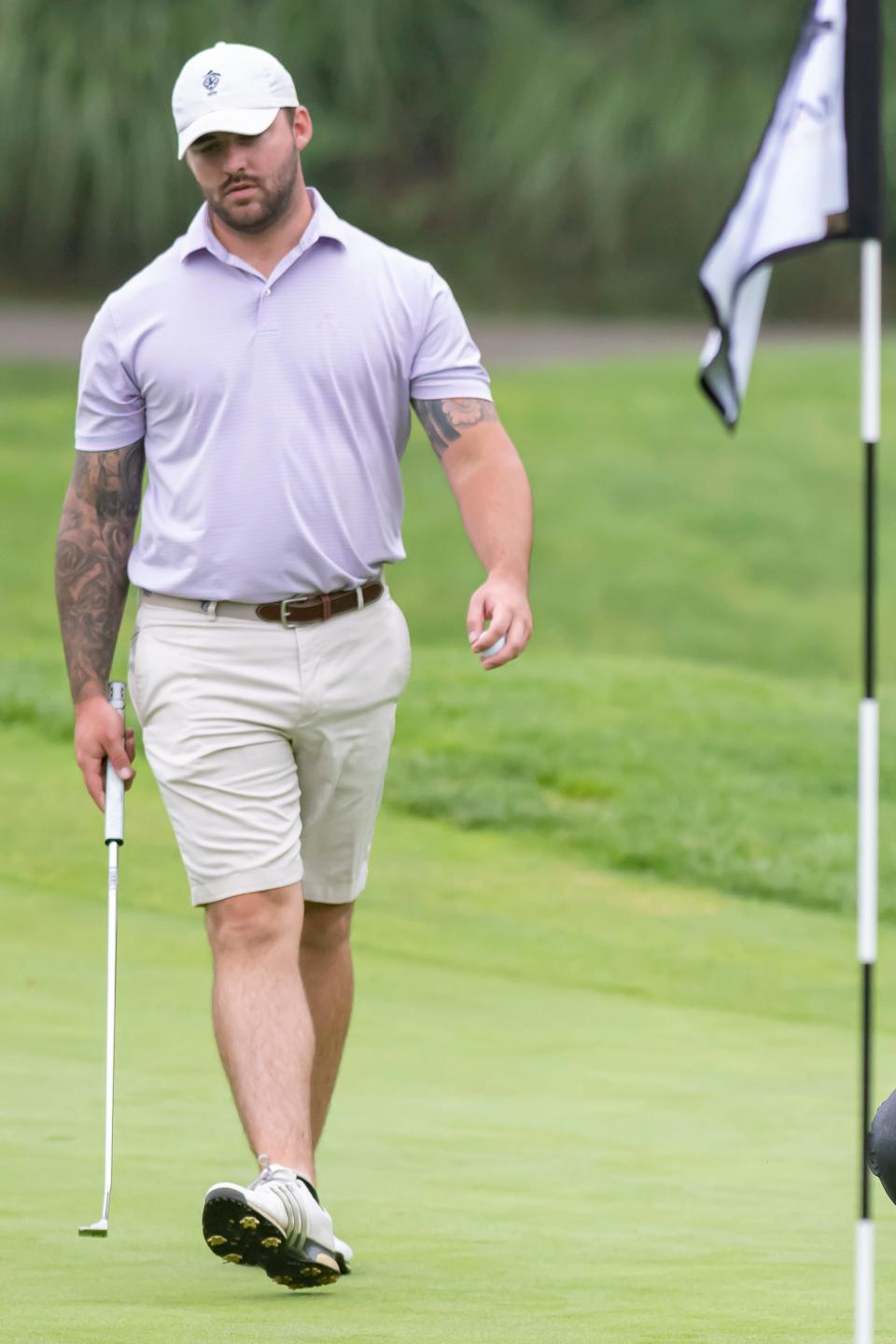 Collin Haag sizes up a putt on the 9th hole at the Men's City Golf Tournament, presented by the Bob Rohrman Auto Group, Sunday Jul. 17, 2022 in West Lafayette.