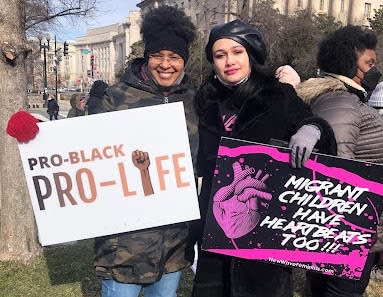 Pro-life activists show their support for the cause. ( Medill News Service)