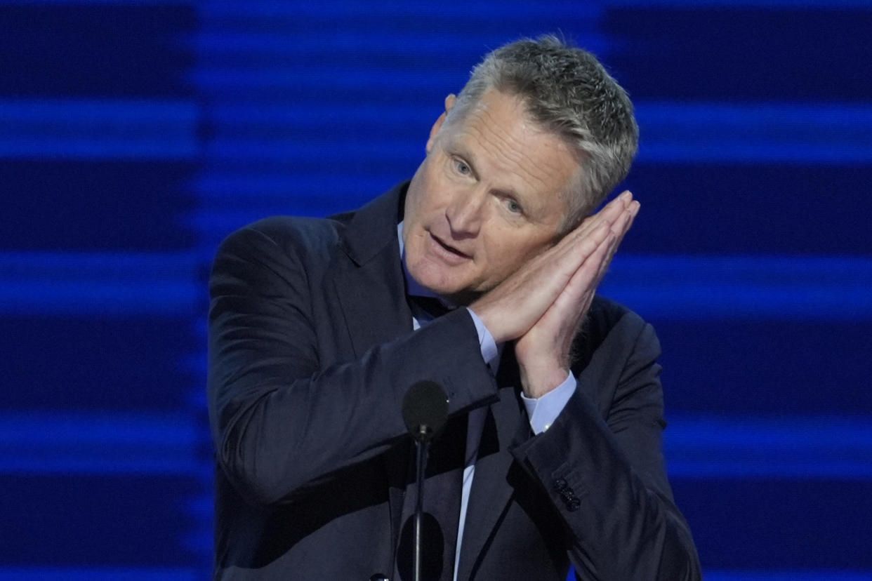 Steve Kerr invoked Stephen Curry's trademark celebration in calling for voters to elect Kamala Harris over Donald Trump. (AP Photo/J. Scott Applewhite)