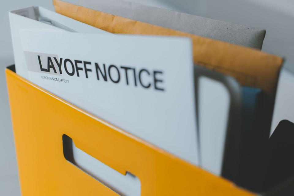 A layoff notice is pictured in this stock photo.