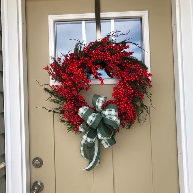 the red wreath on a reviewer's door