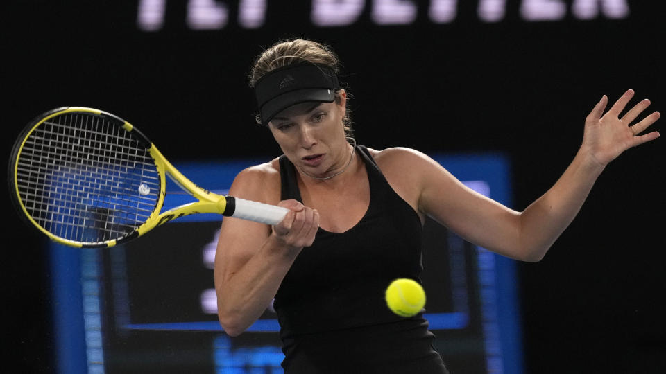 Danielle Collins of the U.S. plays a forehand return to Ash Barty of Australia during the women's singles final at the Australian Open tennis championships in Melbourne, Australia, Saturday, Jan. 29, 2022. (AP Photo/Simon Baker)