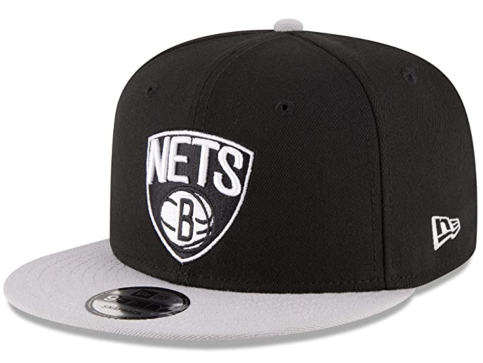 Hat with Brooklyn Nets logo.