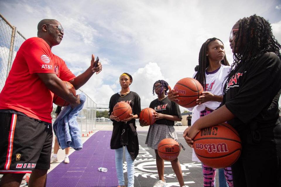 Children wait for directions during a youth basketball clinic hosted by Rolling Loud and the Miami HEAT at the Rolling Loud basketball court outside Hard Rock Stadium in Miami Gardens, Fla., on Wednesday, July 19, 2023.