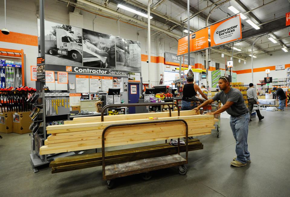 LOS ANGELES - AUGUST 17:  Construction worker Alex Sierra buys lumber for home framing at the Home Depot store on August 17, 2010 in Los Angeles, California. Atlanta-based Home Depot Inc.'s fiscal second-quarter profit rose 6.8 percent as they've seen a 1.8 percent increase in sales.  (Photo by Kevork Djansezian/Getty Images)