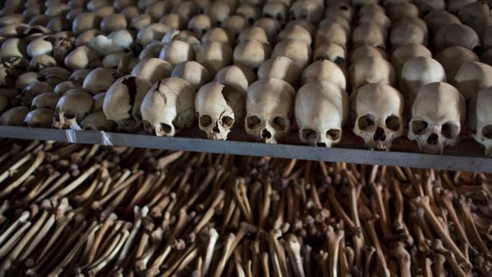 The skulls and bones of some of those who were slaughtered as they sought refuge inside the church are laid out as a memorial to the thousands who were killed in and around the Catholic church during the 1994 genocide in Ntarama in April 2014. A frail 87-year-old Rwandan, Félicien Kabuga, accused of encouraging and bankrolling the 1994 genocide in his home country, goes on trial Thursday at a United Nations tribunal, nearly three decades after the 100-day massacre that left 800,000 dead.(Photo: Ben Curtis/AP, File)