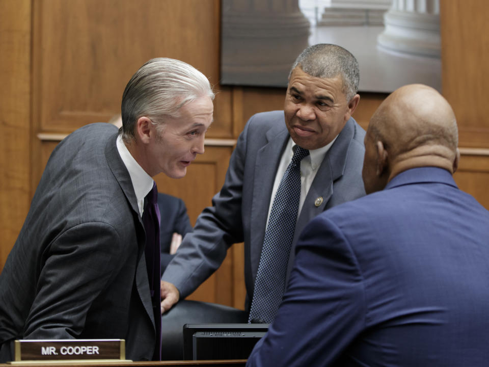 FILE - In this Oct. 12, 2017, file photo, Rep. Trey Gowdy, R-S.C., chairman of the Committee on Oversight and Government Reform, confers with Rep. William Lacy Clay, D-Mo., and Rep. Elijah Cummings, D-Md., the ranking member, before a hearing on preparations for the 2020 Census, on Capitol Hill in Washington. Cori Bush, a onetime homeless woman who led protests following a white police officer's fatal shooting of a Black 18-year-old in Ferguson, Mo., ousted longtime Rep. Clay on Tuesday, Aug. 4, 2020, in Missouri's Democratic primary, ending a political dynasty that has spanned more than a half-century. Bush's victory came in a rematch of 2018, when she failed to capitalize on a national Democratic wave that favored political newcomers such as Bush’s friend, Rep. Alexandria Ocasio-Cortez. (AP Photo/J. Scott Applewhite, File)