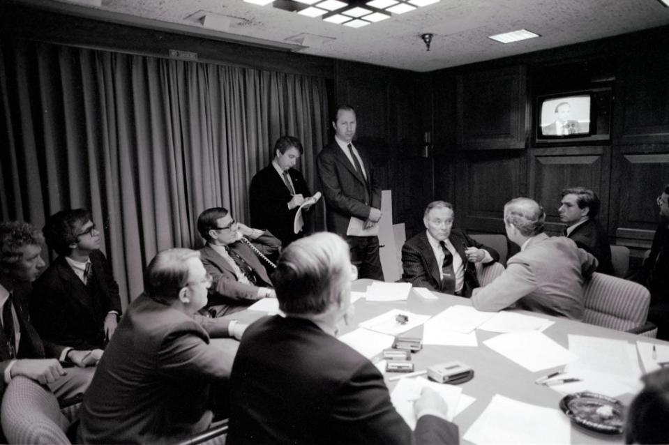 When then-President Reagan was shot in 1981, VP George Bush and staffers gathered in the Situation Room to discuss the attempted assassination. Courtesy Ronald Reagan Presidential Library