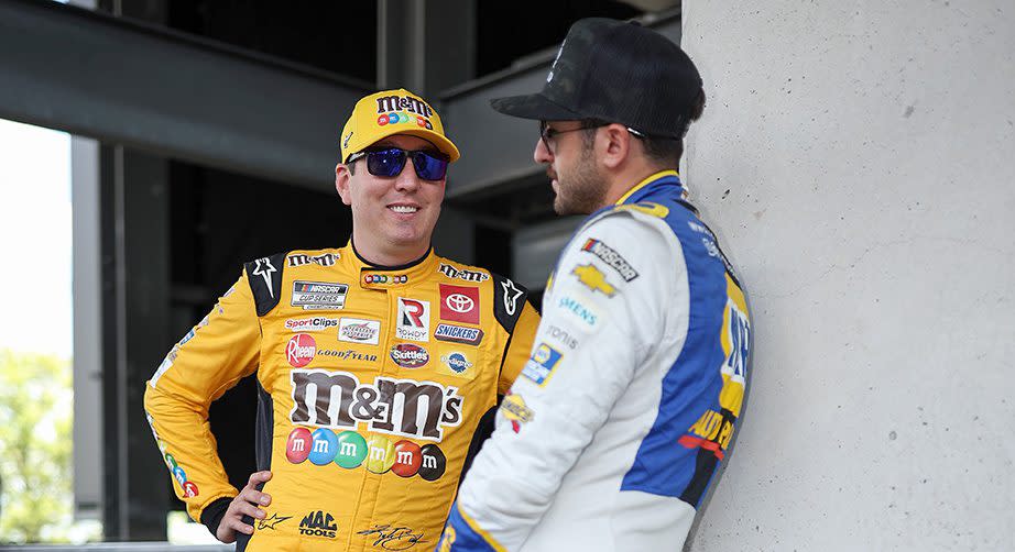 Kyle Busch talks with Chase Elliott