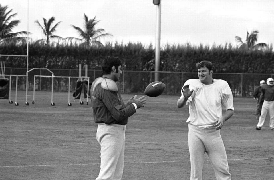 New York Jets quarterback Joe Namath takes a toss from tight end Pete Lammons, right, during a training session in Fort Lauderdale, Fla., Jan. 10, 1969. (AP Photo)